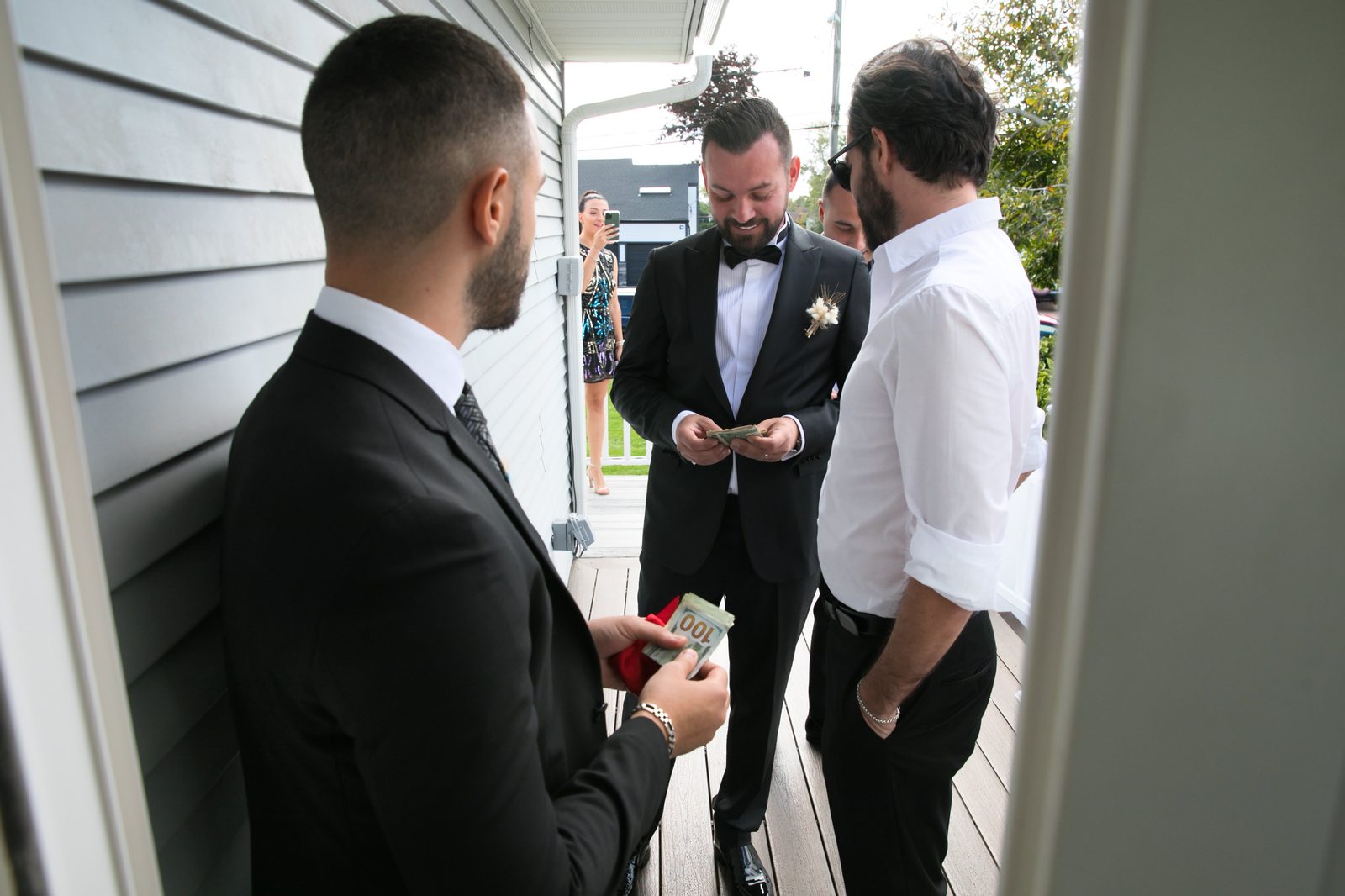 Groomsmen tradition at the door